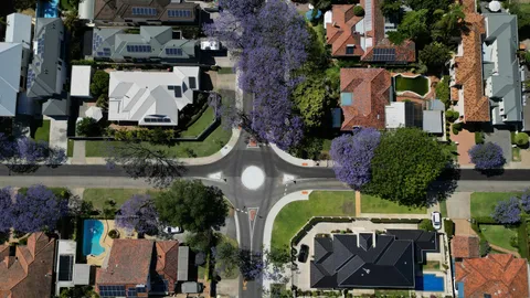 Aerial view of established suburban housing used to illustrate ACT site and lease-purpose due diligence.