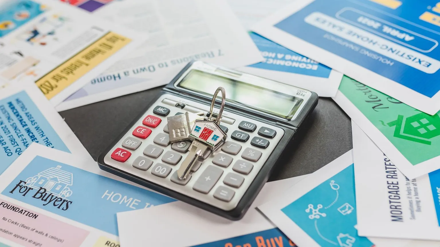 Calculator on real estate finance papers, used to illustrate GST and margin-scheme feasibility assumptions
