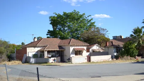 Older suburban house on a corner block