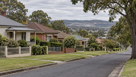 Older single-storey cottages on gently sloping suburban ground