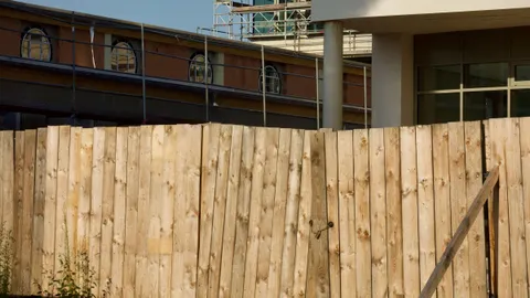 Timber hoarding fence around a construction site